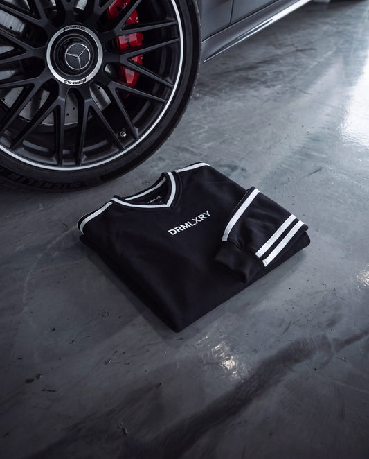 DRMLXRY outfit next to a Mercedes S63 wheel