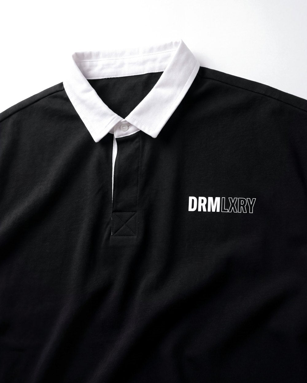 DRMLXRY Club Polo, print close-up