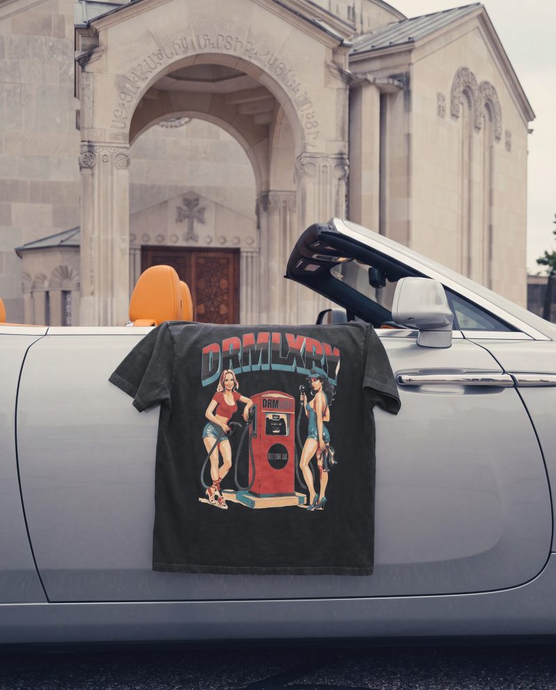 DRMLXRY Full Service Tee on a white Rolls-Royce Dawn
